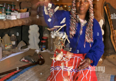 a-traditional-sangoma-throwing-various-objects-she-uses-for-consultations-A6X64W